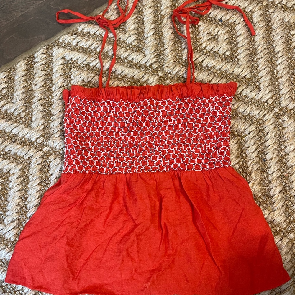 Orange with white stitching tie top